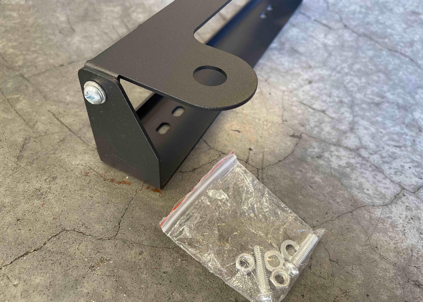 Backwoods Adventure Mods- Flip Up Front License Plate Holder - Hawse Fairlead